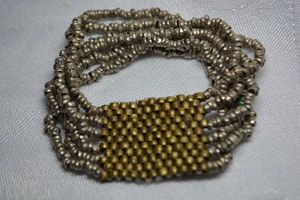 lot 13 image: Artisan crafted brass bead mesh topped multi link stretch bracelet. To 1W