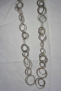 lot 22 image: Hammered multi size link necklace with silver finish. Lobster clasp. 28L with 2 extender
