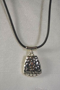 lot 25 image: Pebble finish slide pendant with tube bale on 16L corded necklace with 2 extender. Lobster clasp.