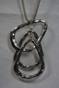 lot 28 image: Hammered tear drop pendant flexible slide necklace. Lobster clasp. 32L with adjustable slide station bead