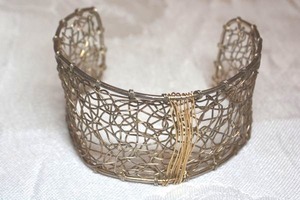 lot 40 image: Gold artisan crafted wire mesh brutalist cuff bracelet. 1.5W