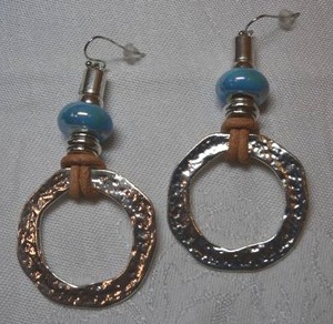 lot 46 image: Hammered disc and mixed material glassrawhide leather French ear wire modernist earrings. 3L