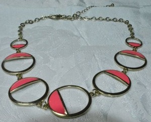 lot 67 image: Modernist open disc station necklace pink enamel accents and lobster clasp. 14L with 3 extender.