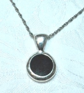 lot 84 image: Modern black enamel large bale pendant on 12L rope necklace with 3 extender.