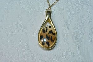 lot 86 image: Modern double sided glass large bale pendant on rope chain necklace. 30L with 2 extender. Double sided pendant - Black on one side and leopard design on reverse.