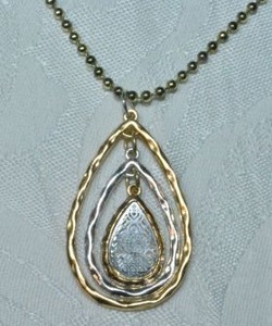 lot 89 image: Modernist articulated tri colored tear drop pendant on 30L gold tone ball bead necklace