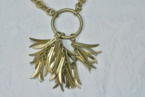 lot 96 image: Modernist industrial textured vintage necklace with ring and curved spike pendant. 28L with lobster clasp. Pendant 3L