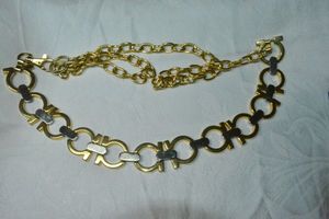lot 102 image: Bi Color polished stainless steel Salvatore Ferragamo style metal link belt. Oversized D-Link clasp.