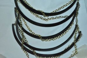 lot 125 image: Black galvanized metal half moon and chain drop necklace. Lobster clasp. Shortest drop 14L, longest 24L.