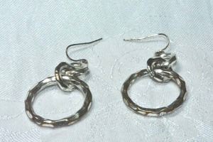 lot 159 image: Industrial hammered disc era wire dangle earrings. 2.25L