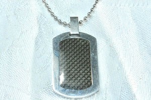lot 195 image: Modernist stainless steel dog tag style hologram pendant on stainless steel ball bead 24L necklace. Both marked Stainless Steel