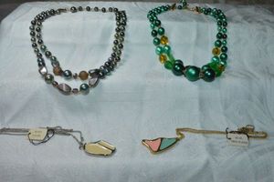 lot 230 image: (2) Vintage Kelly Waters Jewelry Co (Boston, MA 1963 - ) enamel necklaces. Includes (2) mixed material glass bead necklaces.