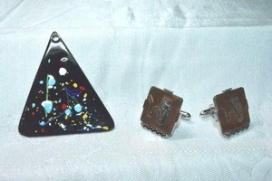 lot 251 image: MCM copper backed enamel large pendant with splatter design and Swank branded copper top clad Cobra snake cufflinks
