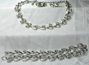 lot 249 image: MCM silver finish demi parure set. Includes 12L necklace with 4 extender, clip earrings and bracelet. 7.5L