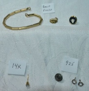 lot 257 image: Mix of marked gold filled, 925 and single 14K earring