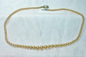 lot 259 image: Cultured pearl strand with sterling silver clasp. Marked sterling on side of clasp. 16L