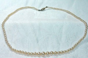 lot 260 image: Cultured pearl strand with sterling silver clasp. Marked sterling on side of clasp. 16L