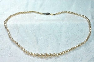 lot 261 image: Cultured pearl strand with sterling silver clasp. Marked sterling on side of clasp. 16L