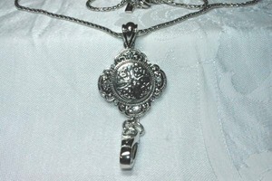 lot 275 image: Signed GS (Ginger Snaps) silver finish flexible necklace  lanyard with magnetic clasp and carabiner style clip pendant. 30L, Drop 3.5L