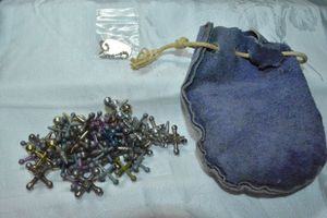 lot 285 image: Vintage Toy. Includes mixed metal cast Jacks in storage pouch (no ball) and a GI Joe tag on ball bead chain.