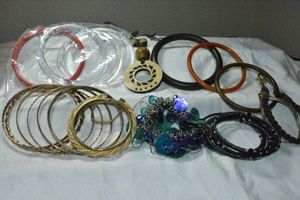 lot 286 image: Vintage bracelets. Includes Acrylic, wood, metal plus.