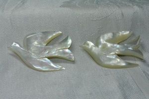 lot 290 image: (2) Mother of Pearl Peace Dove brooches. 2L