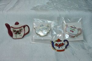 lot 295 image: Enamel teapot theme jewelry. Includes broochpin and (3) lapel pins.