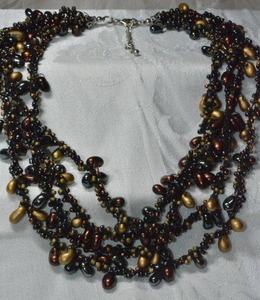 lot 302 image: Multi strand Autumnal glass kidney bead necklace. 18L with 2 extender. Lobster clasp.