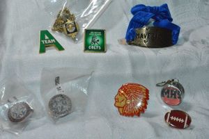 lot 303 image: Northside (Arlington) High School and sports team related jewelry.