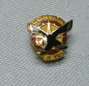 lot 323 image: 10K yellow gold enamel Convair 5 year service anniversary pin. Marked 10K.