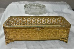 lot 342 image: Vintage gilt metal and footed jewelry Casket with glass top 9L x 4W x 2.75H & Glass lidded keepsake box 4.5L x 3D x 2H