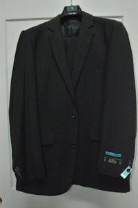 lot 92 image: 2-piece suit by Gulliano Couture Super 150s. Size 44L38L ANGELO. Looks New Never Worn, pants havent been tailored.