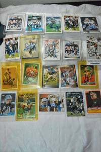 lot 13 image: Misc. signed trading cards Bill Bates, Darren Woodson, Archie Manning just to name a few.