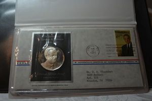 lot 33 image: Lyndon B. Johnson Silver Proof Collectors Coin and First Day of Issue stamp