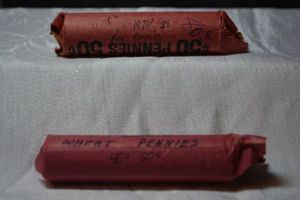 lot 35 image: 2 Rolls of Pennies One Regular roll from 70s-90s, One Wheat roll from 40s-50s.