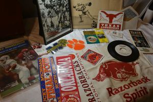 lot 63 image: College Sports collection with Quarterbackin Man 45 and Signed photo from Earl Jones, see photos.