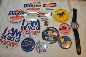 lot 67 image: Democrat party Buttons and Hillary 2004 watch