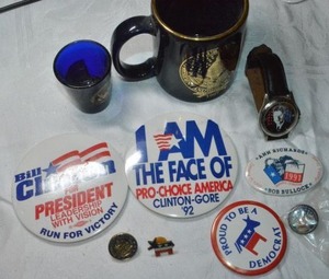 lot 66 image: Bill Clinton blue shot glass and mug, Democrat Buttons and pins, and watch
