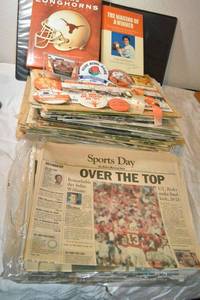 lot 138 image: Univ. of Texas newspapers, Roger Staubach signed book and collector buttons