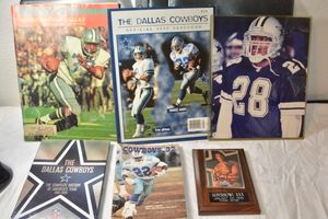lot 147 image: Dallas Cowboys magazines, DVD of football history, Signed plaquecard by Darren Woodson #28