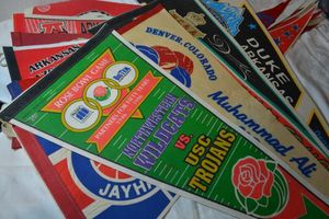 lot 155 image: Sports Pennants Muhammad Ali, NCAA Final Four, KU, and AR razorbacks