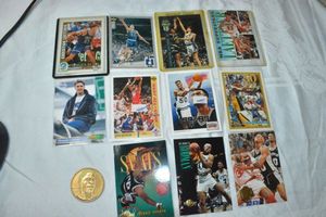 lot 107 image: Dennis Rodman coin and trading cards, Reggie Miller, David Robinson, Christian Laettner trading cards