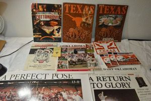 lot 112 image: Univ. of Texas books, stickers, Oklahoma City Player signed program from 1960