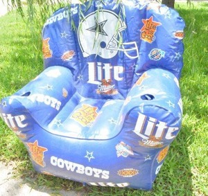 lot 149 image: Dallas Cowboys inflatable chair with cup holders