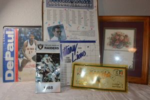 lot 160 image: DePaul Univ. coach Ray Meyer signed magazine, 1986 Penn state calendar, Dallas Stars 1999 Champions envelope, and Wall art for Mother