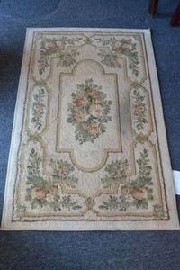 lot 164 image: Entry or small area rug - 31x48. Ashley Bisque.