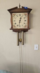 lot 174 image: Wall clock with dangling chimes