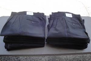 lot 10 image: Lot- New With Tags 20-Pair Of Cintas Black Tux  Band Slacks, All 28-R, Unhemmed Pleated Pants, 100% Polyester