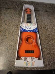 lot 8 image: NIB- 21-UKULELE With Pick.