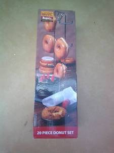 lot 49 image: Everybody LOVES Donuts, 20-Piece Set Including Rack, Donut Pans, 6-Piping Tips & Bag, With Recipes On Box